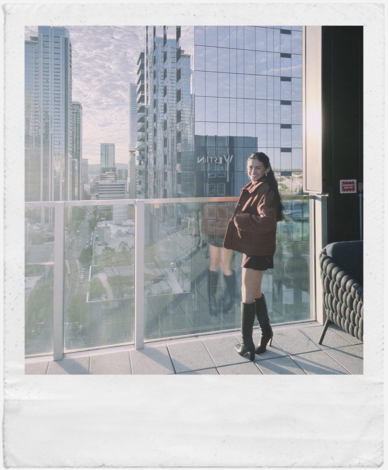 Natasha on a city balcony