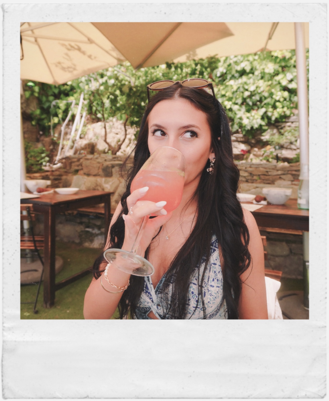 Natasha enjoying a pink drink